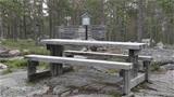 A table and benches are provided next to the observation tower at the top of Vaattunkivaara Hill. Photo: AT